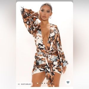 Satin Mini Dress
Long Sleeve
Deep V-Neckline
Tie Front